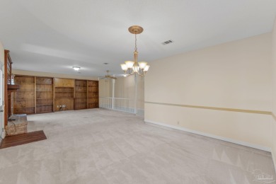 Charming Gulf Breeze brick home nestled in a picturesque setting on Tiger Point Golf and Country Club in Florida - for sale on GolfHomes.com, golf home, golf lot