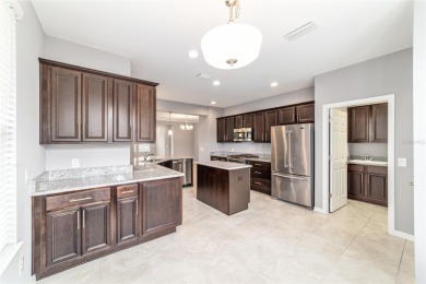 Don't miss out on this beautifully upgraded Monaco model on Trilogy at Ocala Preserve in Florida - for sale on GolfHomes.com, golf home, golf lot