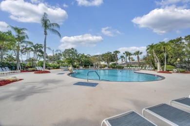 Stunning Courtyard-Style Townhome in the heart of Palm City! on Monarch Country Club in Florida - for sale on GolfHomes.com, golf home, golf lot