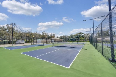 Stunning Courtyard-Style Townhome in the heart of Palm City! on Monarch Country Club in Florida - for sale on GolfHomes.com, golf home, golf lot