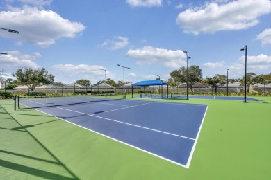 Stunning Courtyard-Style Townhome in the heart of Palm City! on Monarch Country Club in Florida - for sale on GolfHomes.com, golf home, golf lot