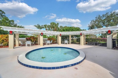 Stunning Courtyard-Style Townhome in the heart of Palm City! on Monarch Country Club in Florida - for sale on GolfHomes.com, golf home, golf lot