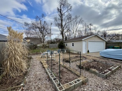 Welcome to this charming 3 bedroom, 1 bath ranch nestled in the on Green Oaks Golf Course in Michigan - for sale on GolfHomes.com, golf home, golf lot