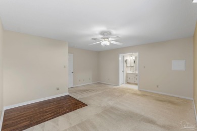 Charming Gulf Breeze brick home nestled in a picturesque setting on Tiger Point Golf and Country Club in Florida - for sale on GolfHomes.com, golf home, golf lot