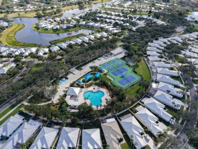 Stunning Courtyard-Style Townhome in the heart of Palm City! on Monarch Country Club in Florida - for sale on GolfHomes.com, golf home, golf lot