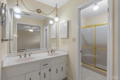 Charming Gulf Breeze brick home nestled in a picturesque setting on Tiger Point Golf and Country Club in Florida - for sale on GolfHomes.com, golf home, golf lot