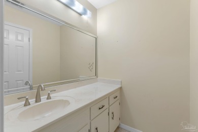 Charming Gulf Breeze brick home nestled in a picturesque setting on Tiger Point Golf and Country Club in Florida - for sale on GolfHomes.com, golf home, golf lot
