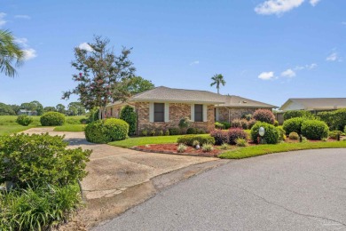 Charming Gulf Breeze brick home nestled in a picturesque setting on Tiger Point Golf and Country Club in Florida - for sale on GolfHomes.com, golf home, golf lot