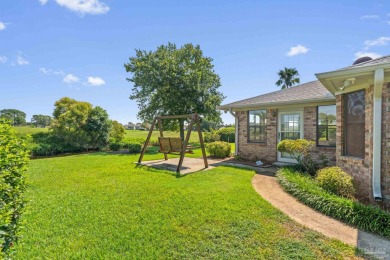Charming Gulf Breeze brick home nestled in a picturesque setting on Tiger Point Golf and Country Club in Florida - for sale on GolfHomes.com, golf home, golf lot