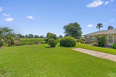 Charming Gulf Breeze brick home nestled in a picturesque setting on Tiger Point Golf and Country Club in Florida - for sale on GolfHomes.com, golf home, golf lot