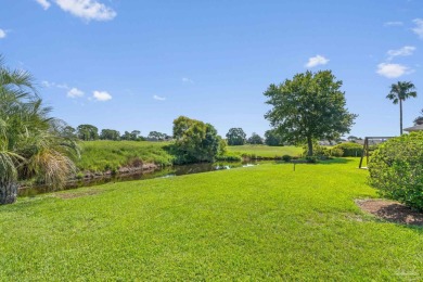 Charming Gulf Breeze brick home nestled in a picturesque setting on Tiger Point Golf and Country Club in Florida - for sale on GolfHomes.com, golf home, golf lot