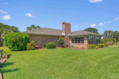 Charming Gulf Breeze brick home nestled in a picturesque setting on Tiger Point Golf and Country Club in Florida - for sale on GolfHomes.com, golf home, golf lot