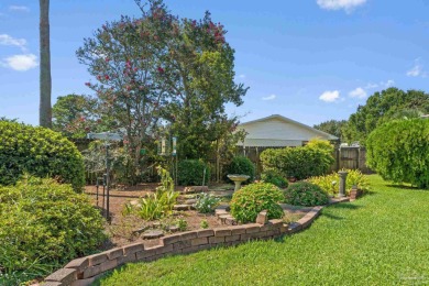 Charming Gulf Breeze brick home nestled in a picturesque setting on Tiger Point Golf and Country Club in Florida - for sale on GolfHomes.com, golf home, golf lot