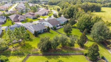 Don't miss out on this beautifully upgraded Monaco model on Trilogy at Ocala Preserve in Florida - for sale on GolfHomes.com, golf home, golf lot