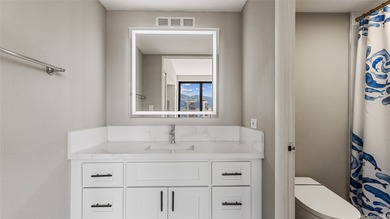 Experience the ultimate luxury in this breathtaking two-story on Ala Wai Golf Course in Hawaii - for sale on GolfHomes.com, golf home, golf lot