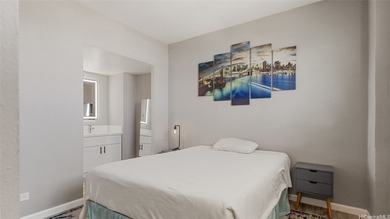 Experience the ultimate luxury in this breathtaking two-story on Ala Wai Golf Course in Hawaii - for sale on GolfHomes.com, golf home, golf lot