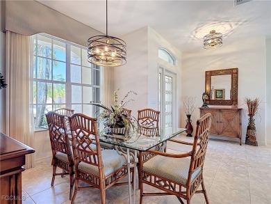 This beautifully maintained Sandpiper home in HERONS GLEN on Herons Glen Golf and Country Club in Florida - for sale on GolfHomes.com, golf home, golf lot