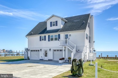 ABSOLUTE STUNNER!! Waterfront living on the Chincoteague Bay on Captains Cove Golf and Yacht Club in Virginia - for sale on GolfHomes.com, golf home, golf lot