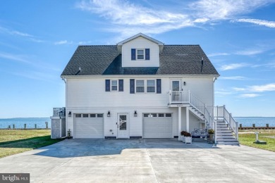 ABSOLUTE STUNNER!! Waterfront living on the Chincoteague Bay on Captains Cove Golf and Yacht Club in Virginia - for sale on GolfHomes.com, golf home, golf lot