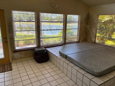 Unique home in Del Tura (55 and over community on leased land) on Del Tura Golf and Country Club in Florida - for sale on GolfHomes.com, golf home, golf lot
