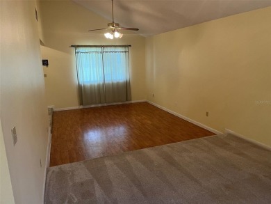 A solid two-story 4 bed/ 2.5 bath, 2 car garage, pool home is on Northdale Golf and Tennis Club in Florida - for sale on GolfHomes.com, golf home, golf lot