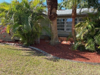 Unique home in Del Tura (55 and over community on leased land) on Del Tura Golf and Country Club in Florida - for sale on GolfHomes.com, golf home, golf lot