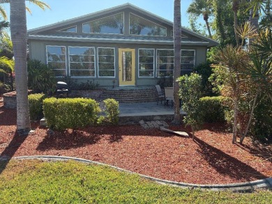 Unique home in Del Tura (55 and over community on leased land) on Del Tura Golf and Country Club in Florida - for sale on GolfHomes.com, golf home, golf lot