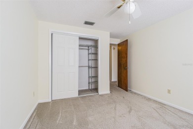 A solid 4 bed/ 2.5 bath, 2 car garage, pool home is located in on Northdale Golf and Tennis Club in Florida - for sale on GolfHomes.com, golf home, golf lot