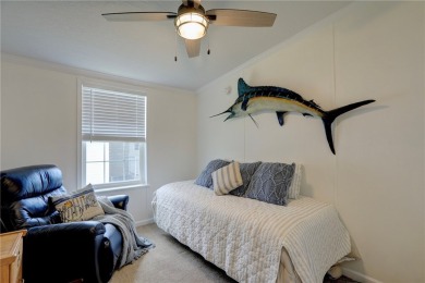 Enjoy direct golf course and water views from this beautifully on Barefoot Bay Golf Course in Florida - for sale on GolfHomes.com, golf home, golf lot
