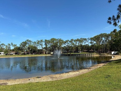 Unique home in Del Tura (55 and over community on leased land) on Del Tura Golf and Country Club in Florida - for sale on GolfHomes.com, golf home, golf lot