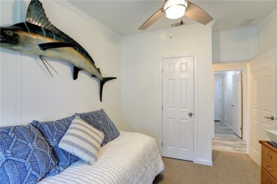 Enjoy direct golf course and water views from this beautifully on Barefoot Bay Golf Course in Florida - for sale on GolfHomes.com, golf home, golf lot