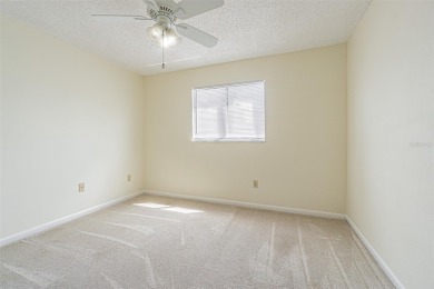 A solid 4 bed/ 2.5 bath, 2 car garage, pool home is located in on Northdale Golf and Tennis Club in Florida - for sale on GolfHomes.com, golf home, golf lot