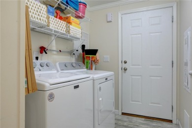 Enjoy direct golf course and water views from this beautifully on Barefoot Bay Golf Course in Florida - for sale on GolfHomes.com, golf home, golf lot