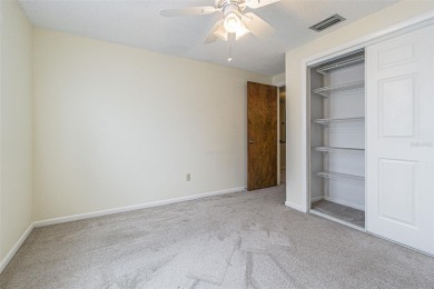 A solid 4 bed/ 2.5 bath, 2 car garage, pool home is located in on Northdale Golf and Tennis Club in Florida - for sale on GolfHomes.com, golf home, golf lot