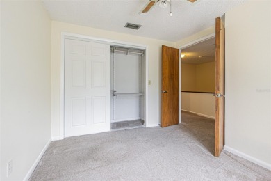 A solid 4 bed/ 2.5 bath, 2 car garage, pool home is located in on Northdale Golf and Tennis Club in Florida - for sale on GolfHomes.com, golf home, golf lot