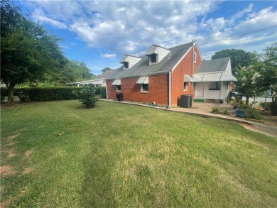 Check out this charming 3 bedroom, 1 bath bungalow in Decatur on East Lake Golf Club in Georgia - for sale on GolfHomes.com, golf home, golf lot