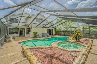 A solid 4 bed/ 2.5 bath, 2 car garage, pool home is located in on Northdale Golf and Tennis Club in Florida - for sale on GolfHomes.com, golf home, golf lot