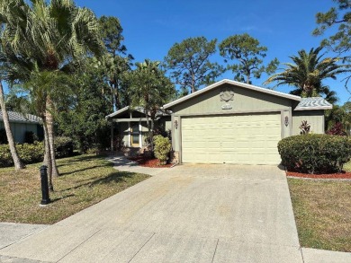 Unique home in Del Tura (55 and over community on leased land) on Del Tura Golf and Country Club in Florida - for sale on GolfHomes.com, golf home, golf lot