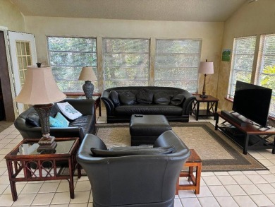 Unique home in Del Tura (55 and over community on leased land) on Del Tura Golf and Country Club in Florida - for sale on GolfHomes.com, golf home, golf lot