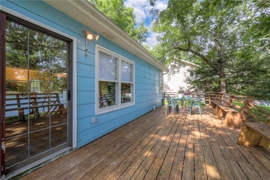 This quaint and charming LAKEFRONT bungalow offers a peaceful on Linn Valley Lakes - Deer Trace Golf Course in Kansas - for sale on GolfHomes.com, golf home, golf lot