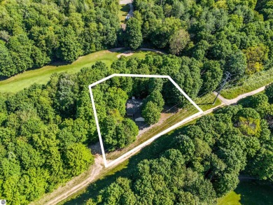 Nestled amidst four-season splendor, this home spans over 3100 on Schuss Mountain Golf Club in Michigan - for sale on GolfHomes.com, golf home, golf lot