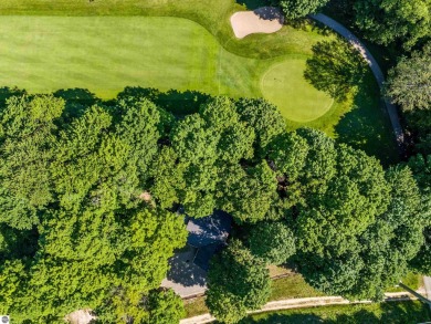 Nestled amidst four-season splendor, this home spans over 3100 on Schuss Mountain Golf Club in Michigan - for sale on GolfHomes.com, golf home, golf lot