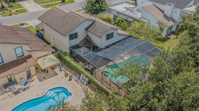 A solid 4 bed/ 2.5 bath, 2 car garage, pool home is located in on Northdale Golf and Tennis Club in Florida - for sale on GolfHomes.com, golf home, golf lot