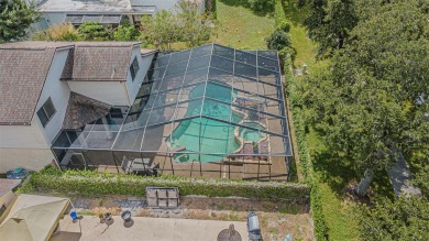 A solid 4 bed/ 2.5 bath, 2 car garage, pool home is located in on Northdale Golf and Tennis Club in Florida - for sale on GolfHomes.com, golf home, golf lot