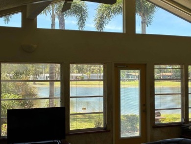 Unique home in Del Tura (55 and over community on leased land) on Del Tura Golf and Country Club in Florida - for sale on GolfHomes.com, golf home, golf lot