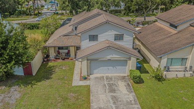A solid 4 bed/ 2.5 bath, 2 car garage, pool home is located in on Northdale Golf and Tennis Club in Florida - for sale on GolfHomes.com, golf home, golf lot