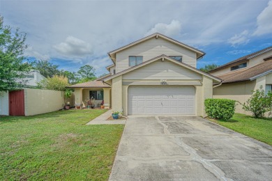 A solid 4 bed/ 2.5 bath, 2 car garage, pool home is located in on Northdale Golf and Tennis Club in Florida - for sale on GolfHomes.com, golf home, golf lot