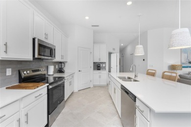 This beautifully appointed second floor Veranda with a Social on Heritage Landing Golf  in Florida - for sale on GolfHomes.com, golf home, golf lot