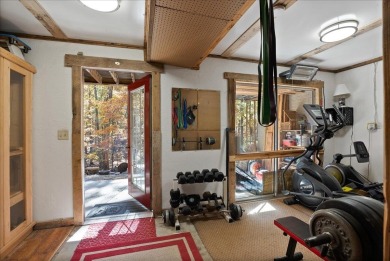 Stunning Contemporary log home, private lot backing up to wooded on Woodstone Meadows Golf Course At Massanutten in Virginia - for sale on GolfHomes.com, golf home, golf lot
