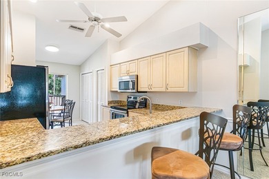 Discover Florida living at its finest in this beautifully on Olde Hickory Golf and Country Club in Florida - for sale on GolfHomes.com, golf home, golf lot